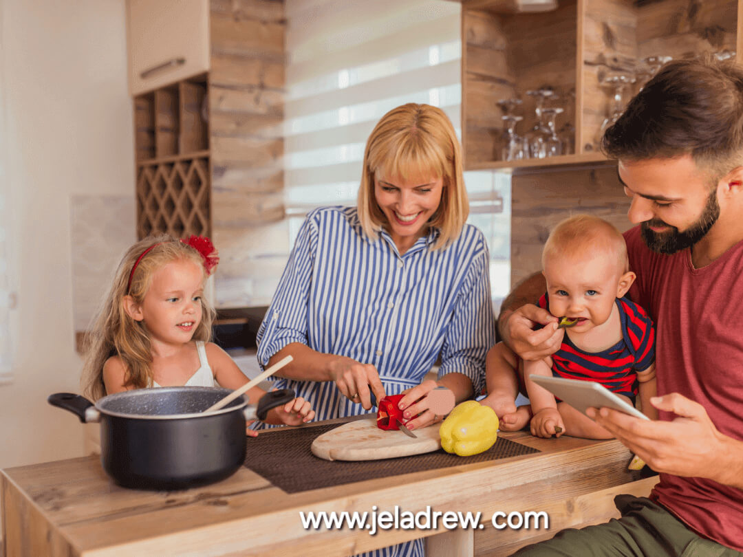 A-cheerful-family-of-four-is-gathered-in-a-modern-kitchen-engaging in a cooking activity together