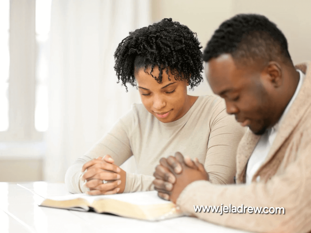 Christian-couple-praying-together-with-bible-symbolizing-pillar-of-faith-and-love-in-marriage-featured-image