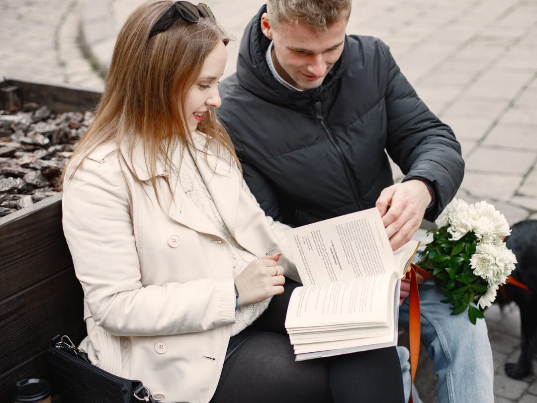 Couple-reading-a-book-together-ways-to-celebrate-wedding-anniversary