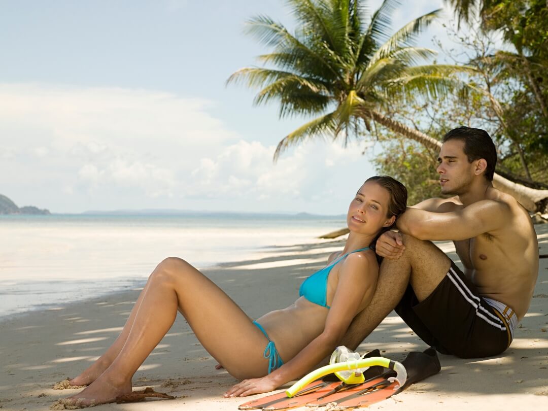 Couple-at-the-beach-reflecting