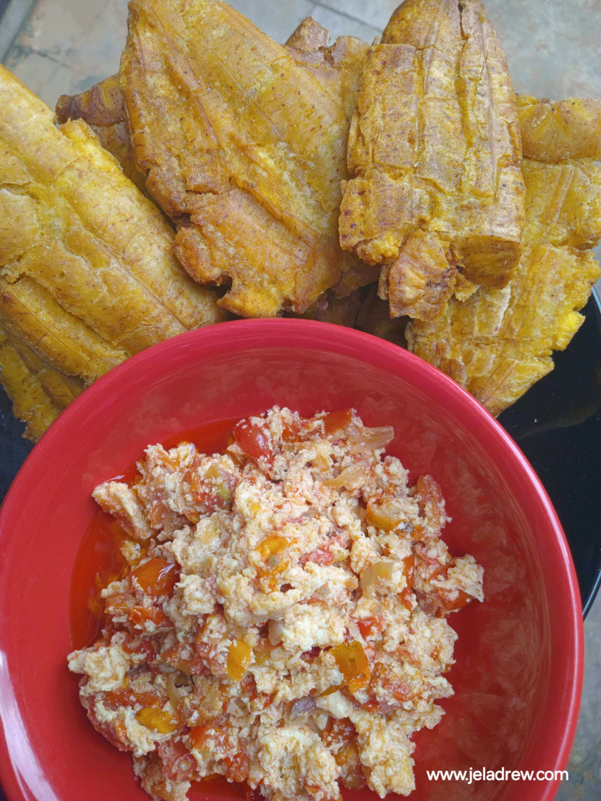 Pressed-unripe-plantain-served-with-egg-sauce