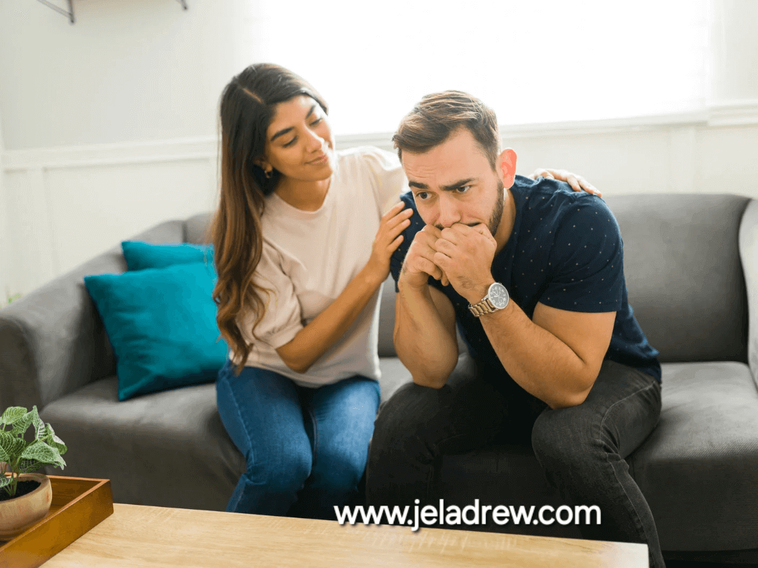 A-wife-listen-with-empathy-while-sitting-on-a-couch-patting-the-husband-
