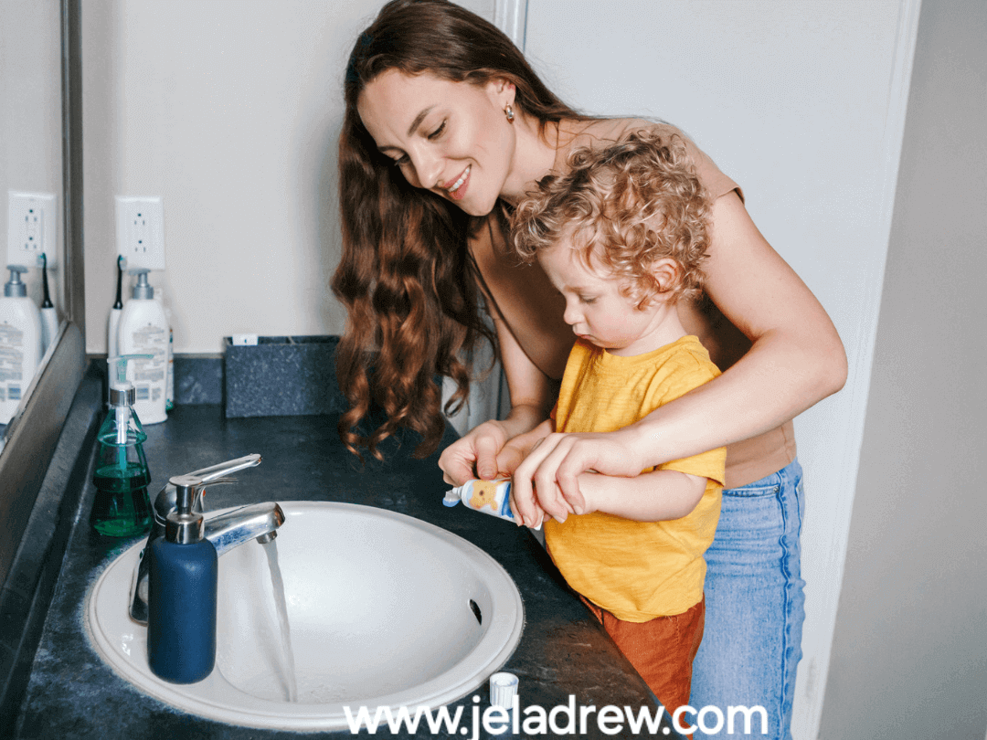 Parent-demonstrating to-a-toddler-how-to-brush-their-teeth-helping-establish-daily-routines-and-healthy-habits-practical-parenting-advice