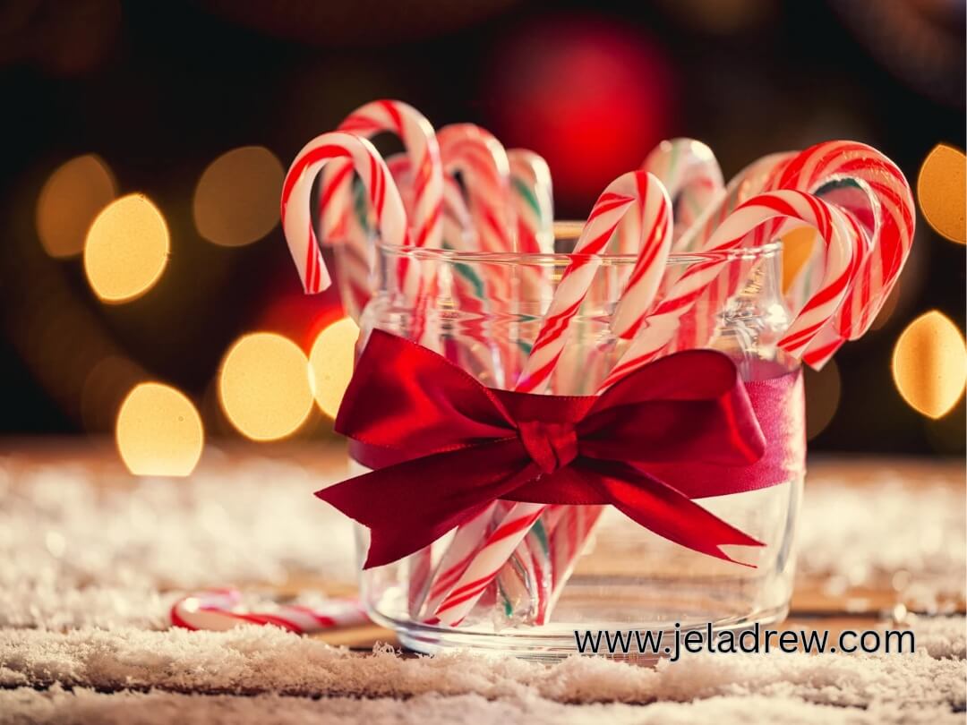 Candy-canes-in-a-jar-tied-with-ribon-on-the-table
