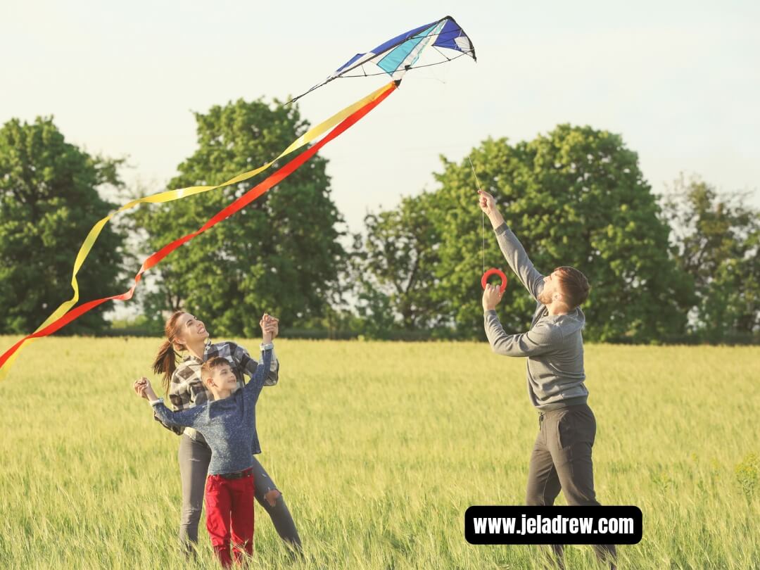 Family-flying-a-colorful-kite-on-a-breezy-spring-after-noon.