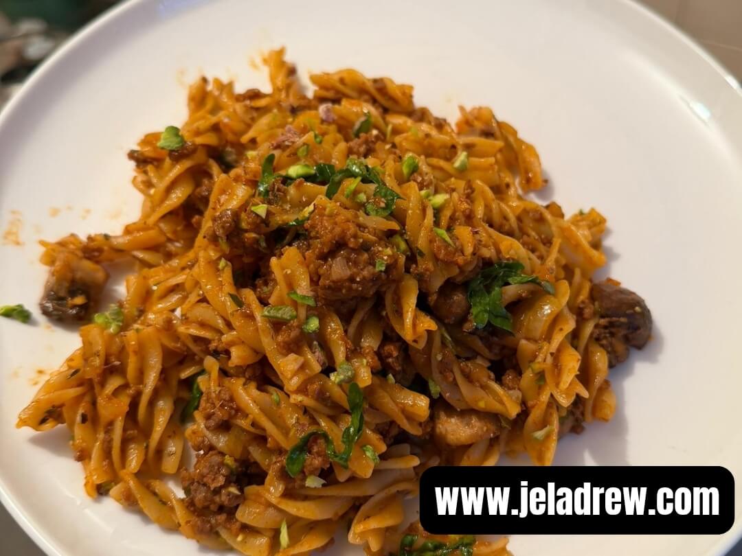 One-pot-beef-ragu-pasta-served-on-a-white-plate