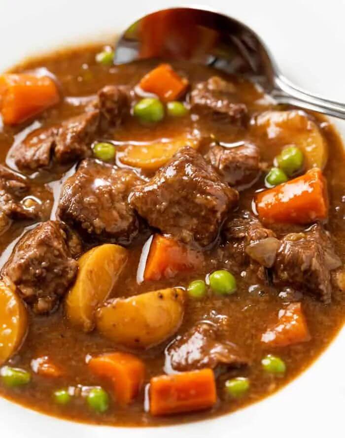 Hearty-beef-stew-with-carrots,-potatoes-and-peas.crock-pot-recipe-for-families