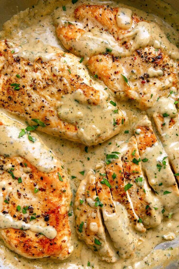 Creamy-garlic-chicken-breasts-in-a-rich-herb-sauce-20-easy-crockpot-rrecipes-for-busy-families