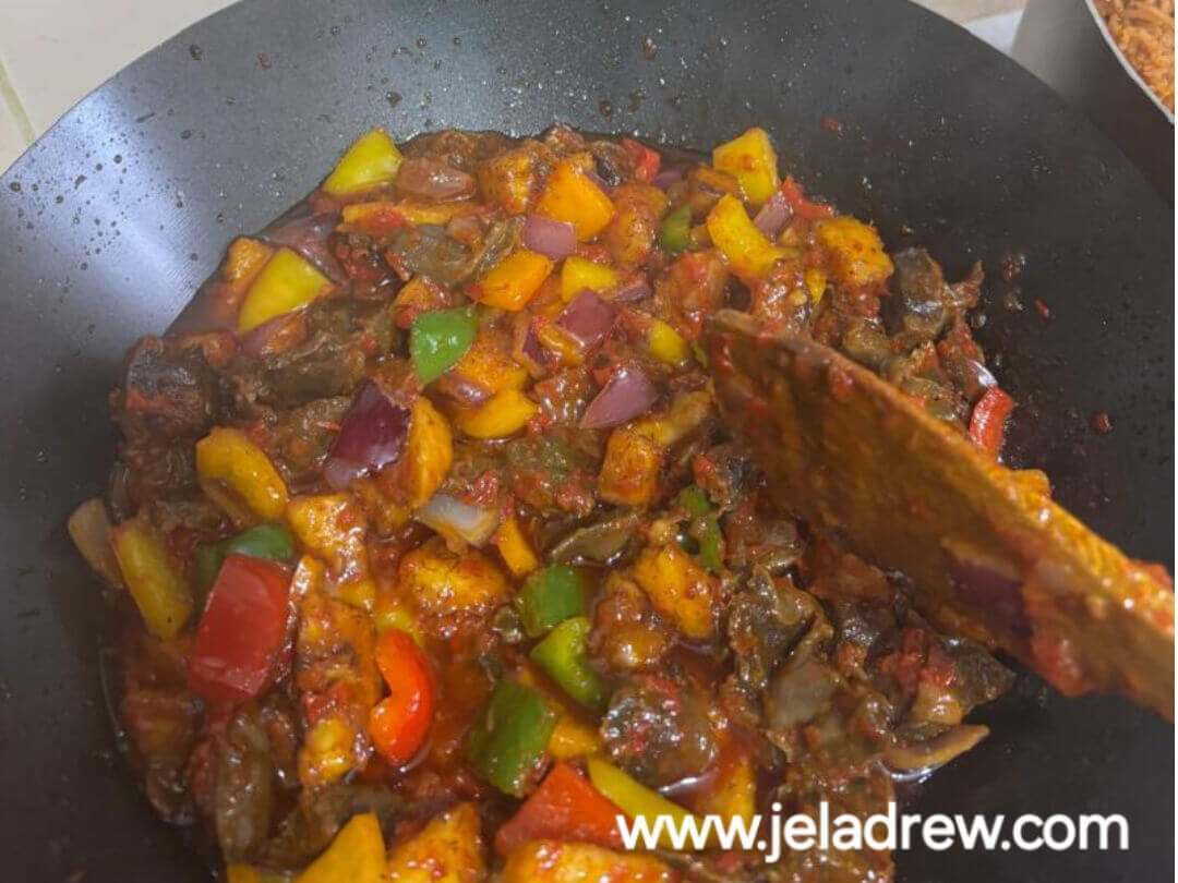 gizzard-with-dice--fried-carrot-bell-peppers-and-plantain-in-a-rich-sauce