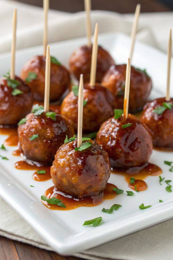 meatballs-with-tooth-picks-on-a-white-serving-plate-baby-shower-food
