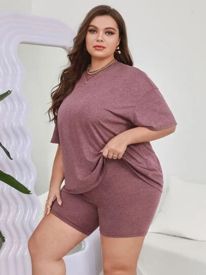 Plus-size-woman-wearing-a-coordinated-two-piece-shorts-lounge-set-and-clean-sneakers-perfect-for-errands-or-game-days.